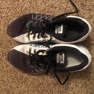 Black and white nike tennis shoes